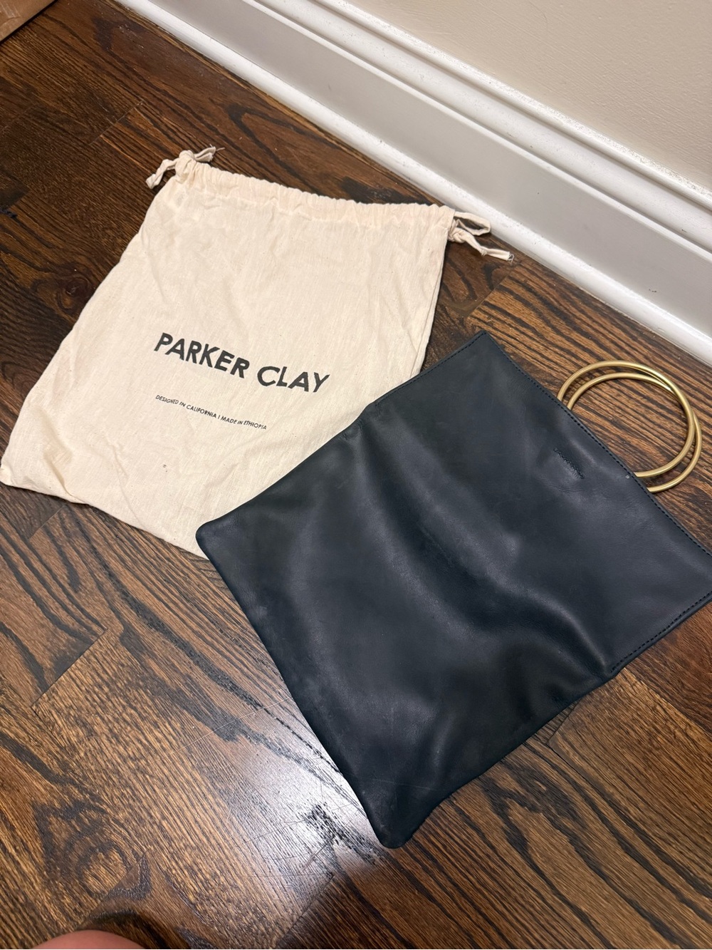 Parker Clay Black Leather Clutch with Gold Ring Handles (dust bag included)